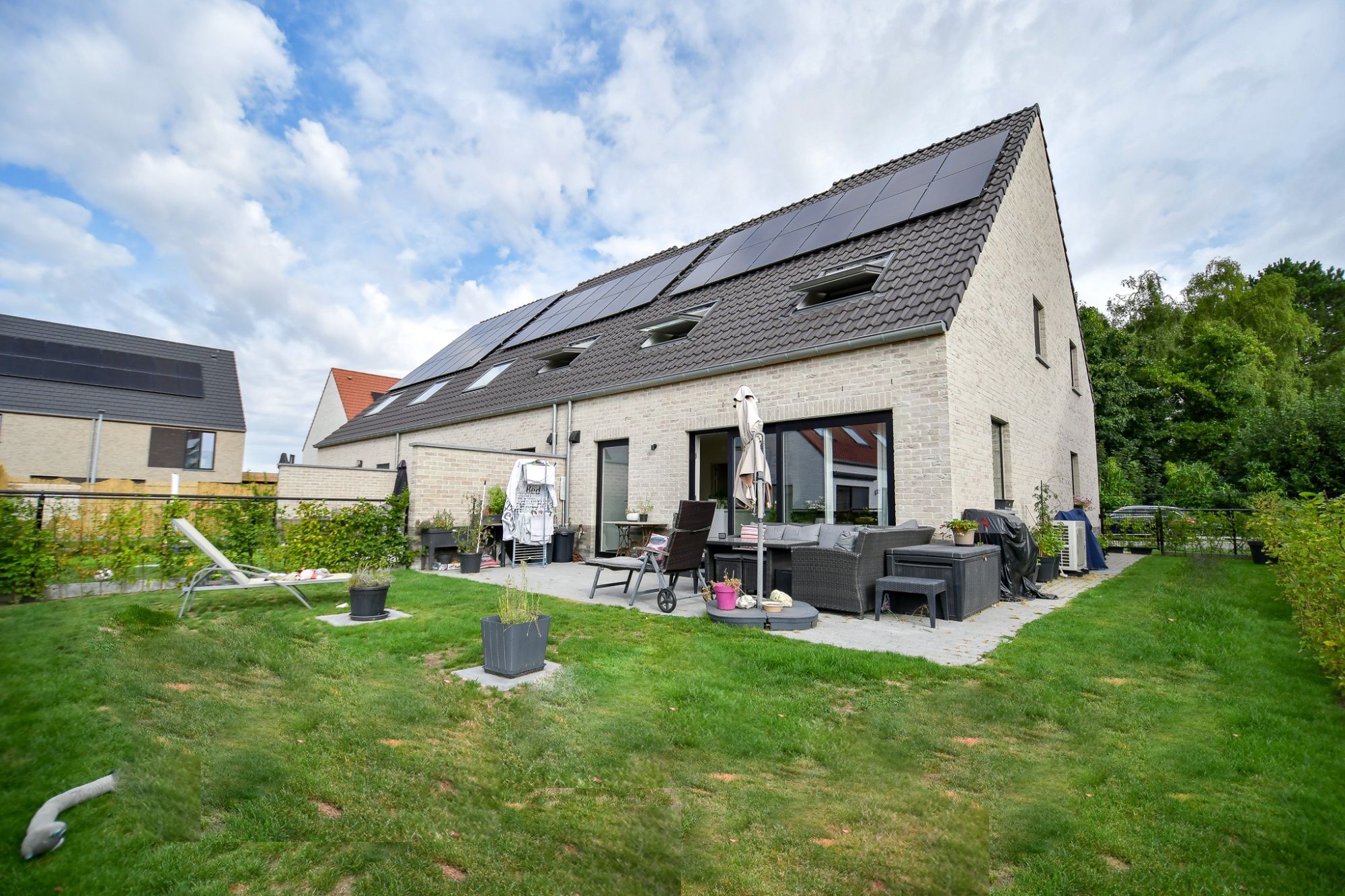 RUSTIG GELEGEN, RUIME woning met zongerichte tuin en garage foto 17