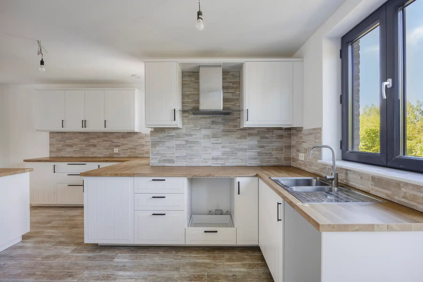Nieuwbouw triplex met 4 slaap- en badkamers, tuin en parking foto 8