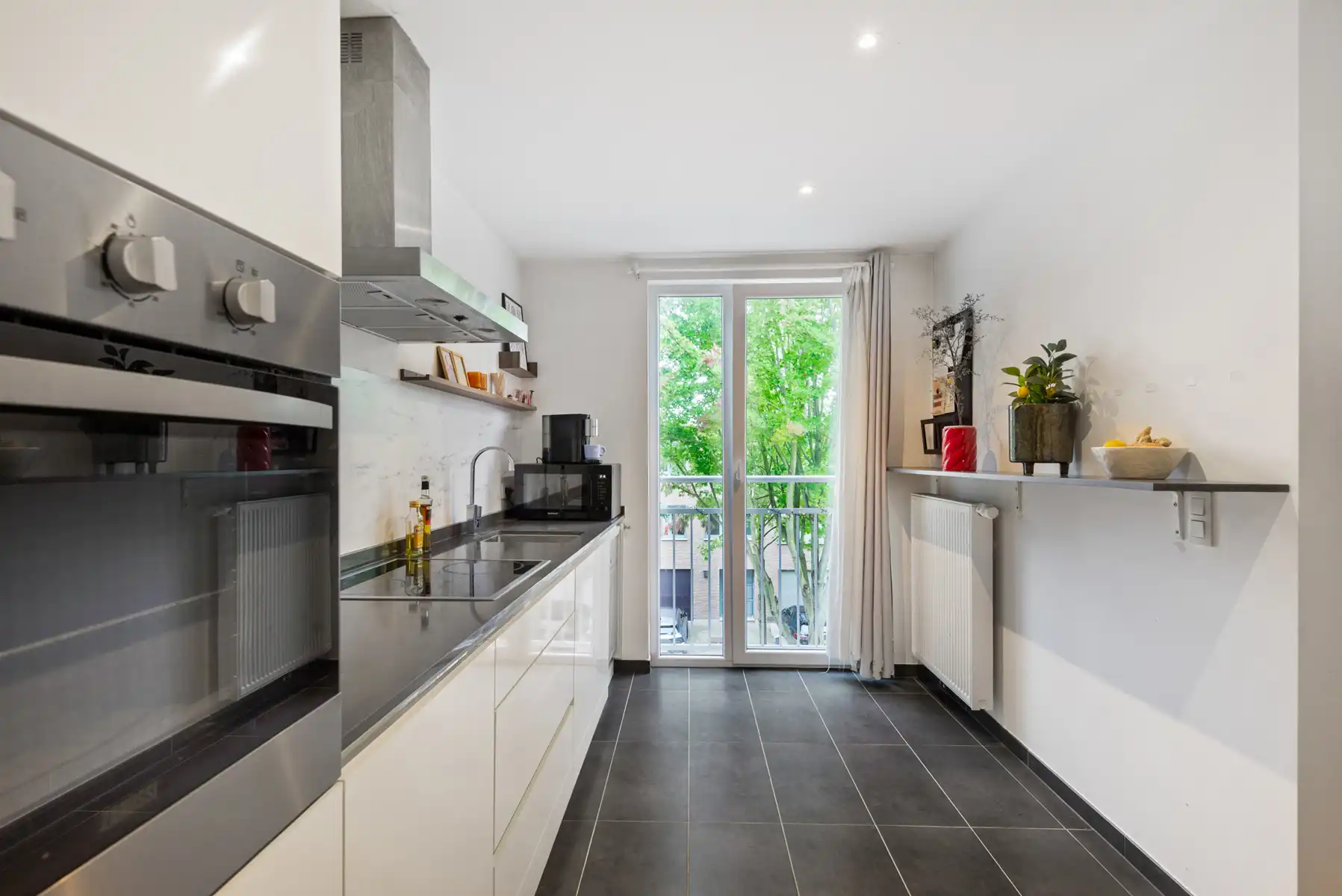 Atypisch ruim appartement met drie slaapkamers foto 12