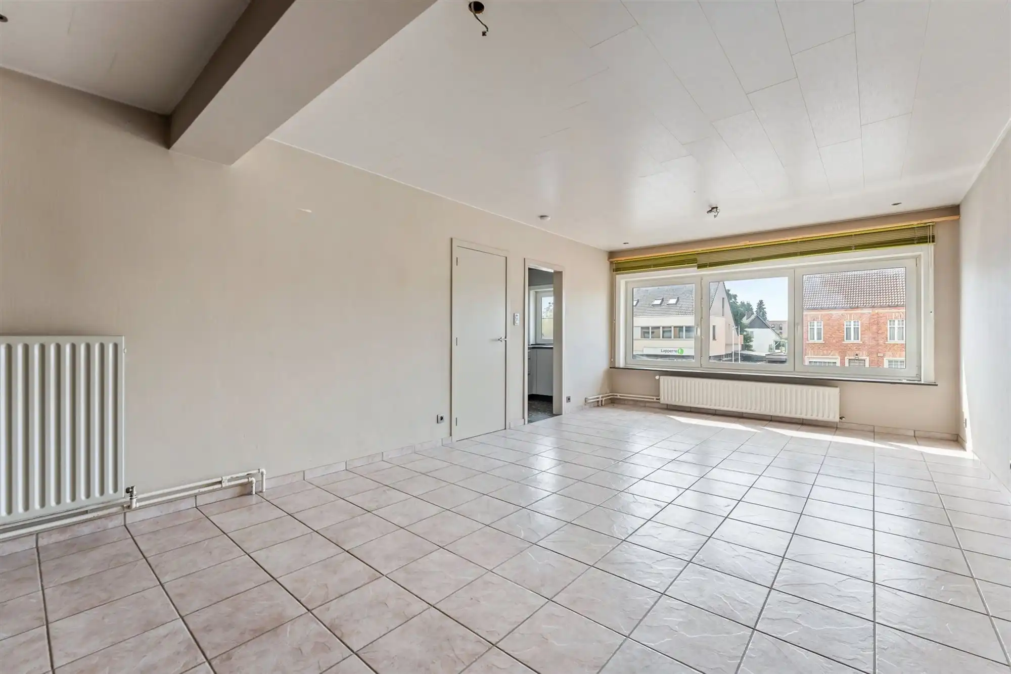 CENTRAAL GELEGEN EN INSTAPKLAAR APPARTEMENT MET 2 SLAAPKAMERS EN GARAGE NABIJ PAAL DORP foto {{pictureIndex}}