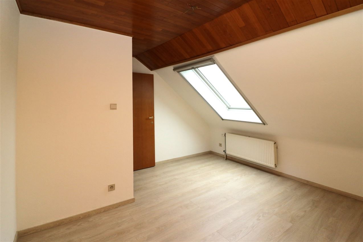 Centraal gelegen appartement met 3 slpk., garage en terras foto 19