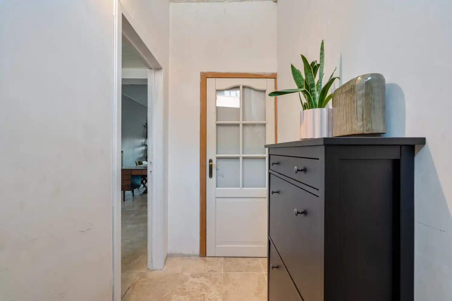 Goed gelegen halfopen bebouwing met 3 slaapkamers en een tuin met een poortje naar de straat te Wilsele! foto 3