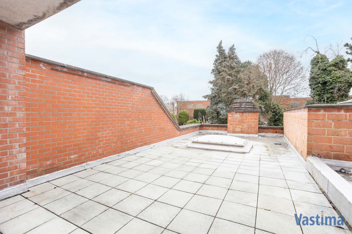 Lichtrijk leefappartement met 2 slaapkamers, ruim terras en garage foto 12