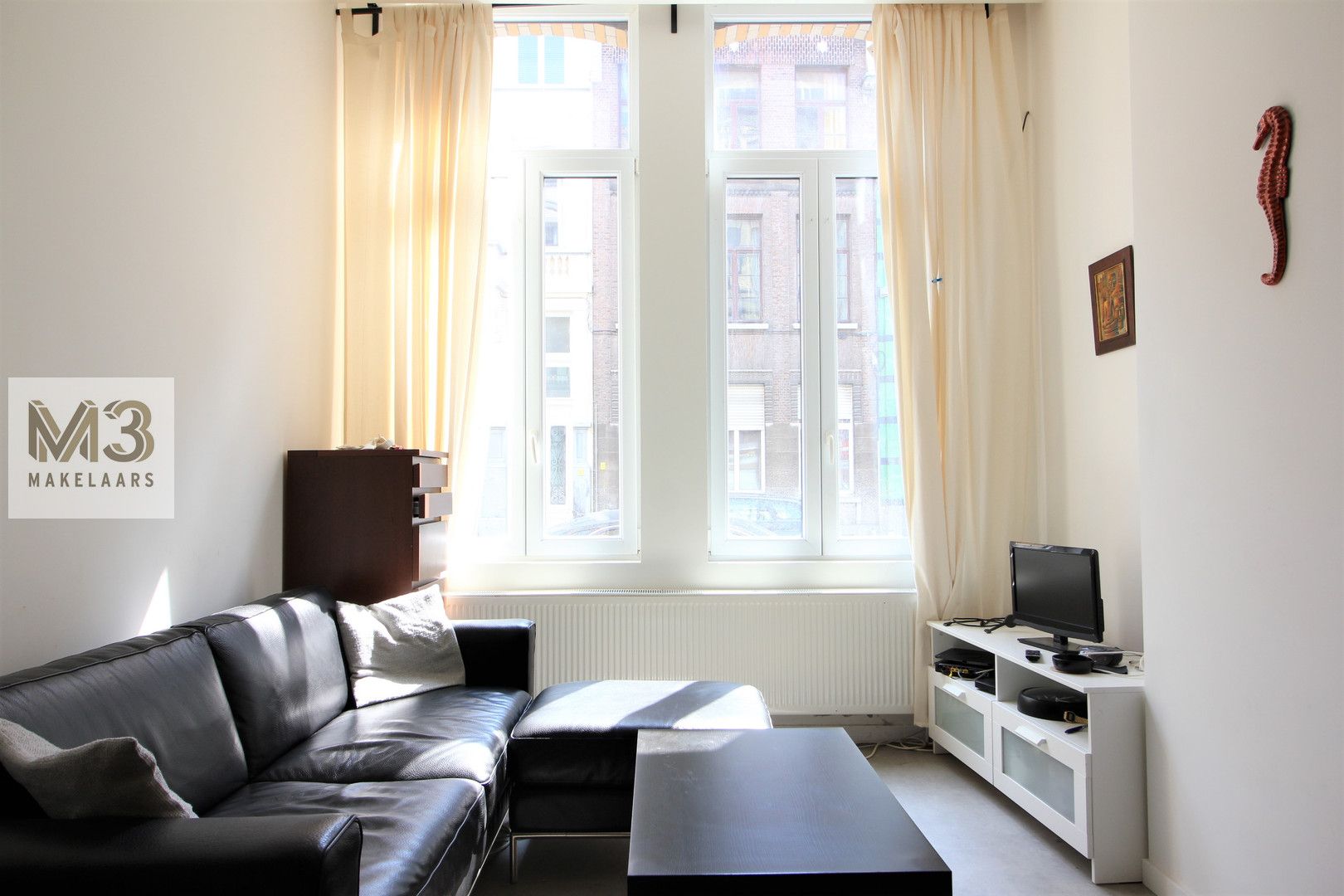Bemeubelde studio met aparte slpk foto {{pictureIndex}}