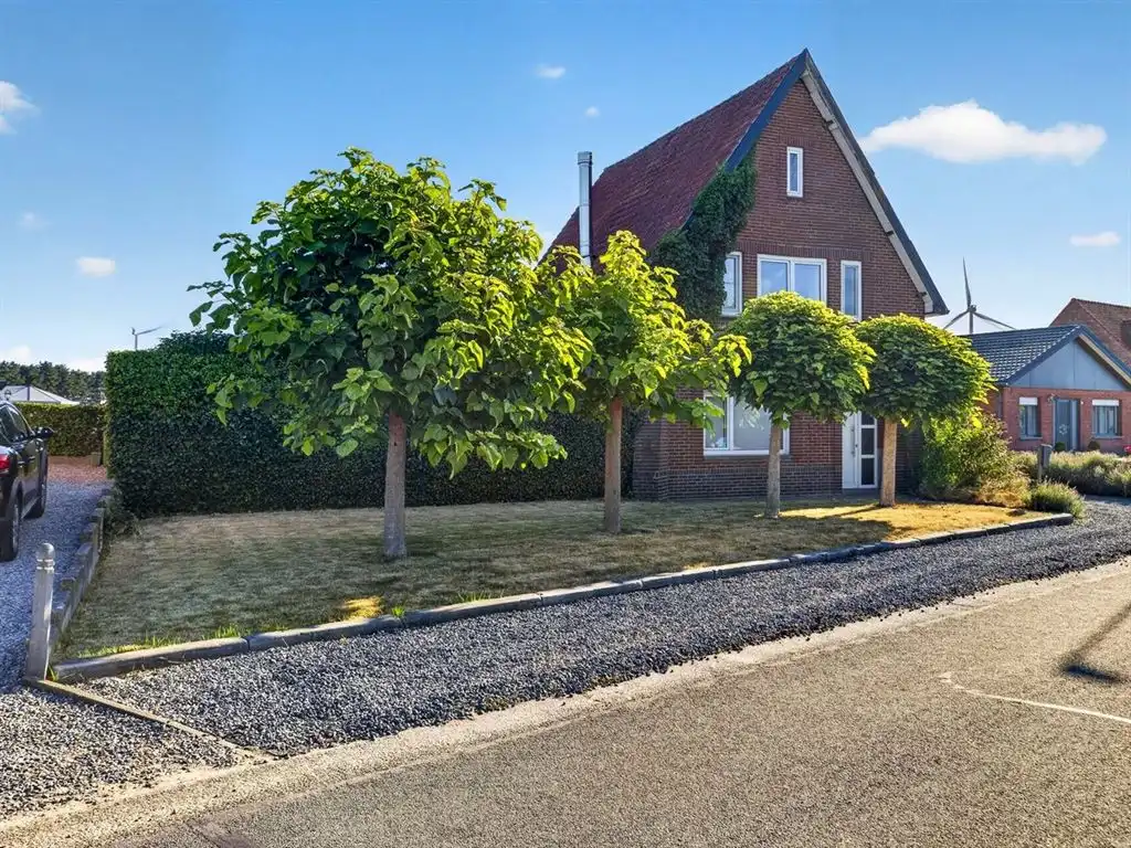 Charmante, rustig gelegen vrijstaande woning foto 2
