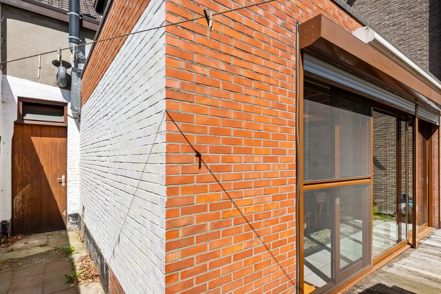 Te renoveren huis met 3 slaapkamers, garage en tuin in Wijnegem foto 11