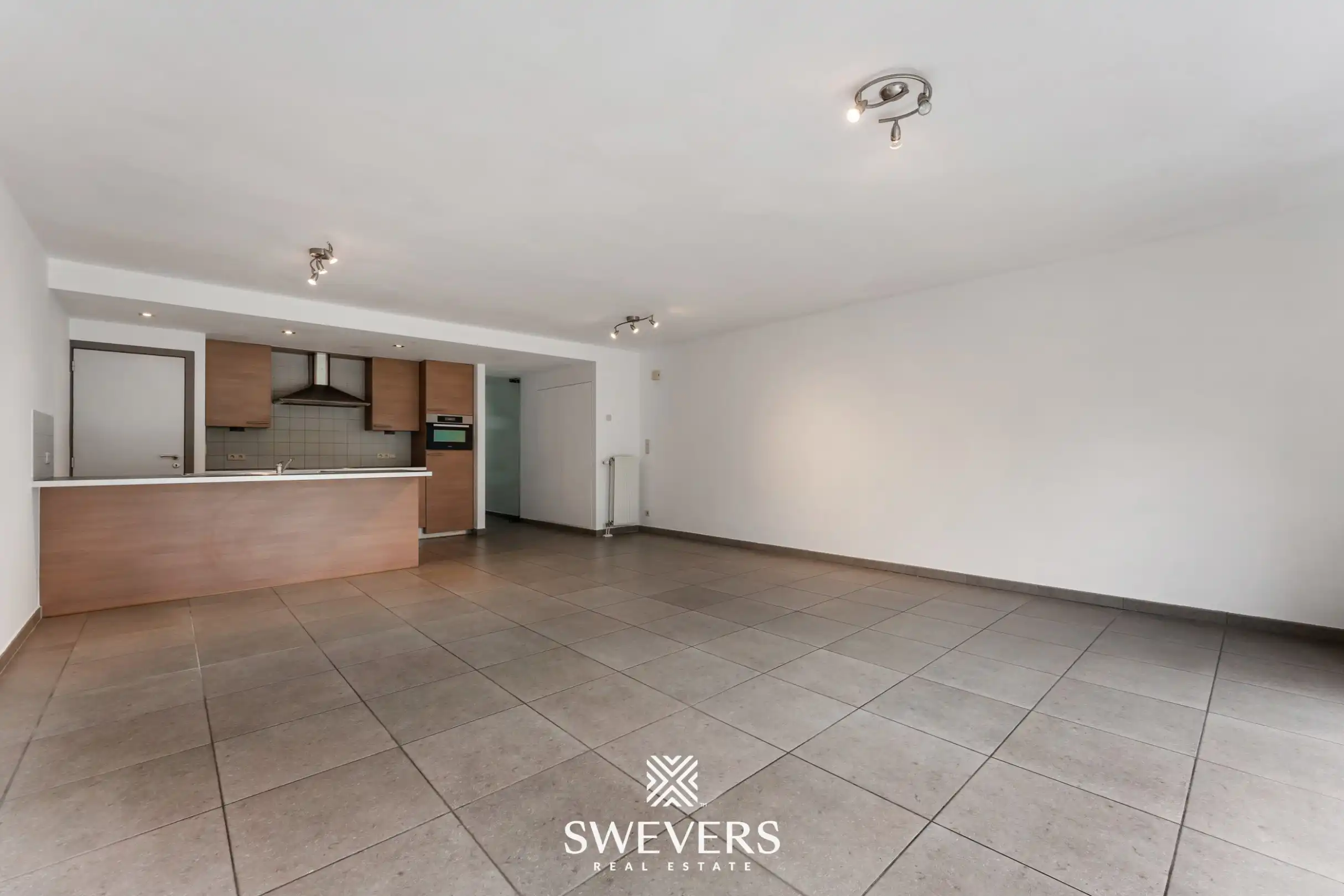 Ruim duplex appartement met 2 slaapkamers en tuin foto 3