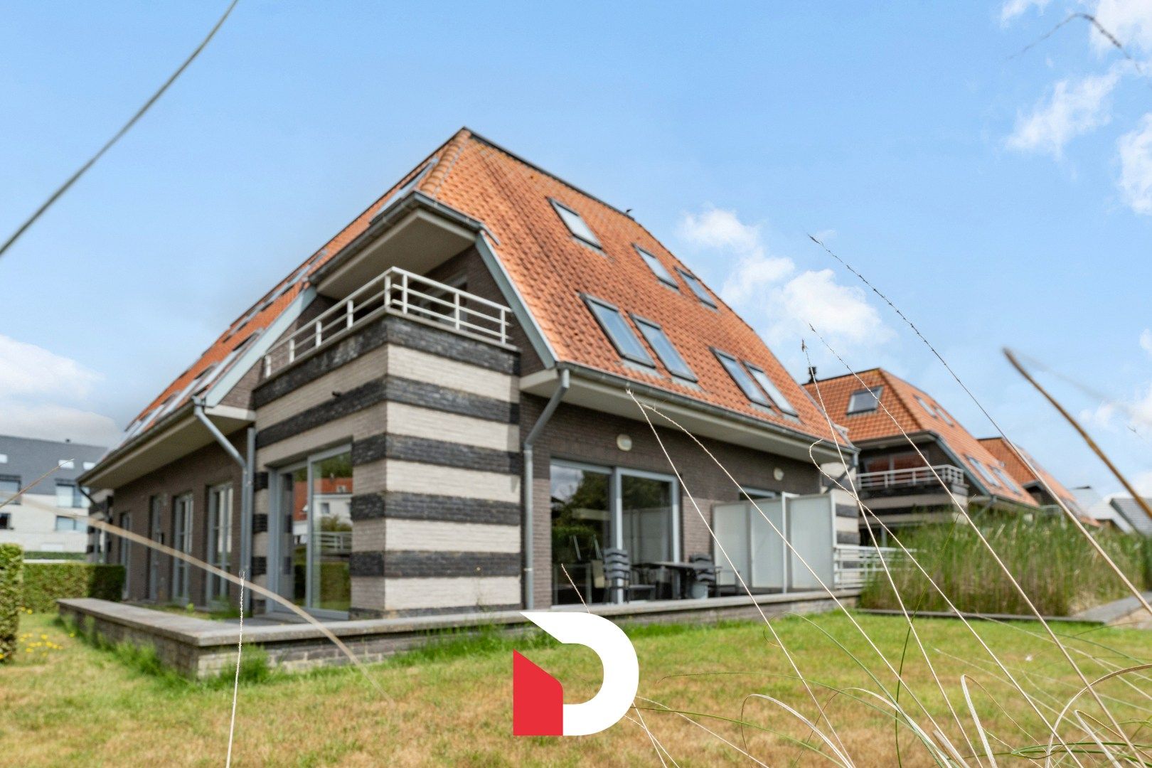 Ruim duplexappartement met 3 slaapkamers in De Haan aan zee foto {{pictureIndex}}