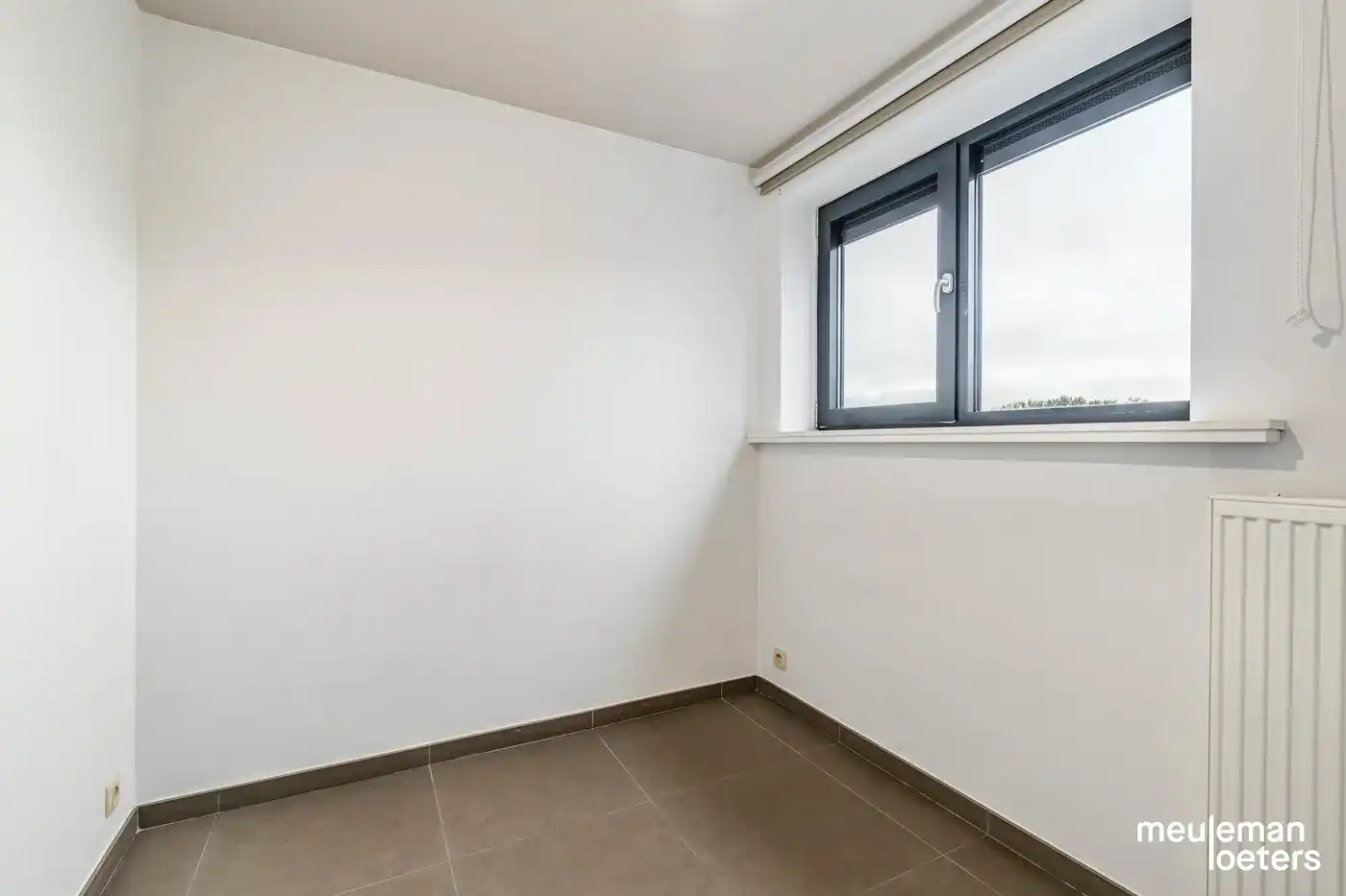 Lichtrijk en eigentijds penthouse met drie slaapkamers, twee terrassen en overdekte parkeerplaats foto 12