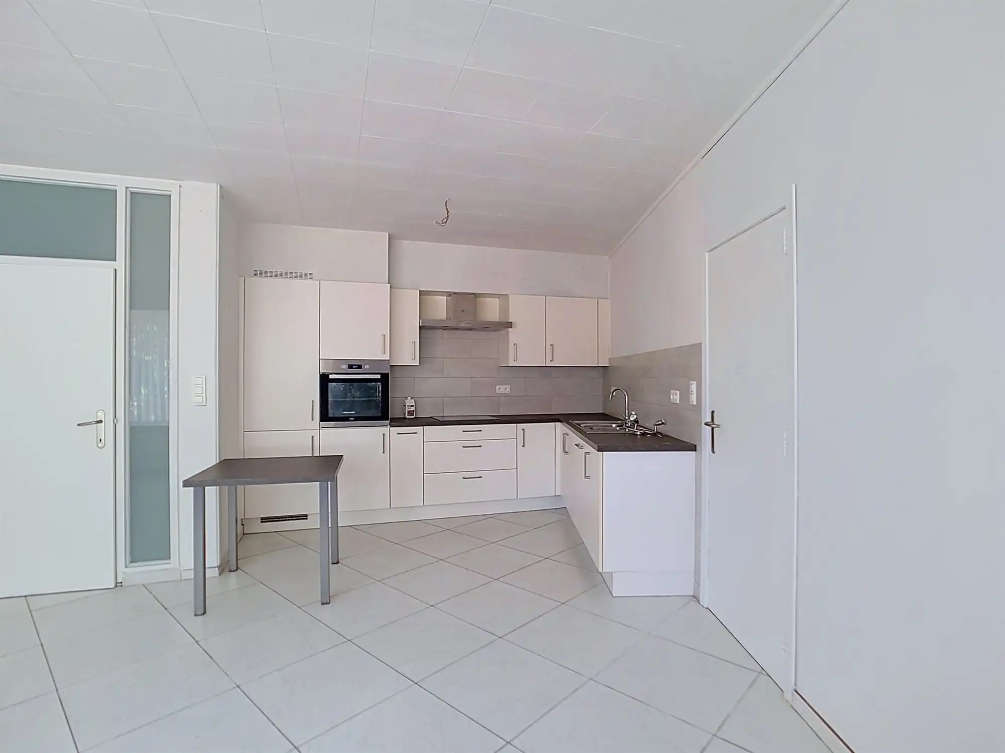 Gelijkvloers appartement met 2 slaapkamers, polyvalente ruimte en garage foto 3