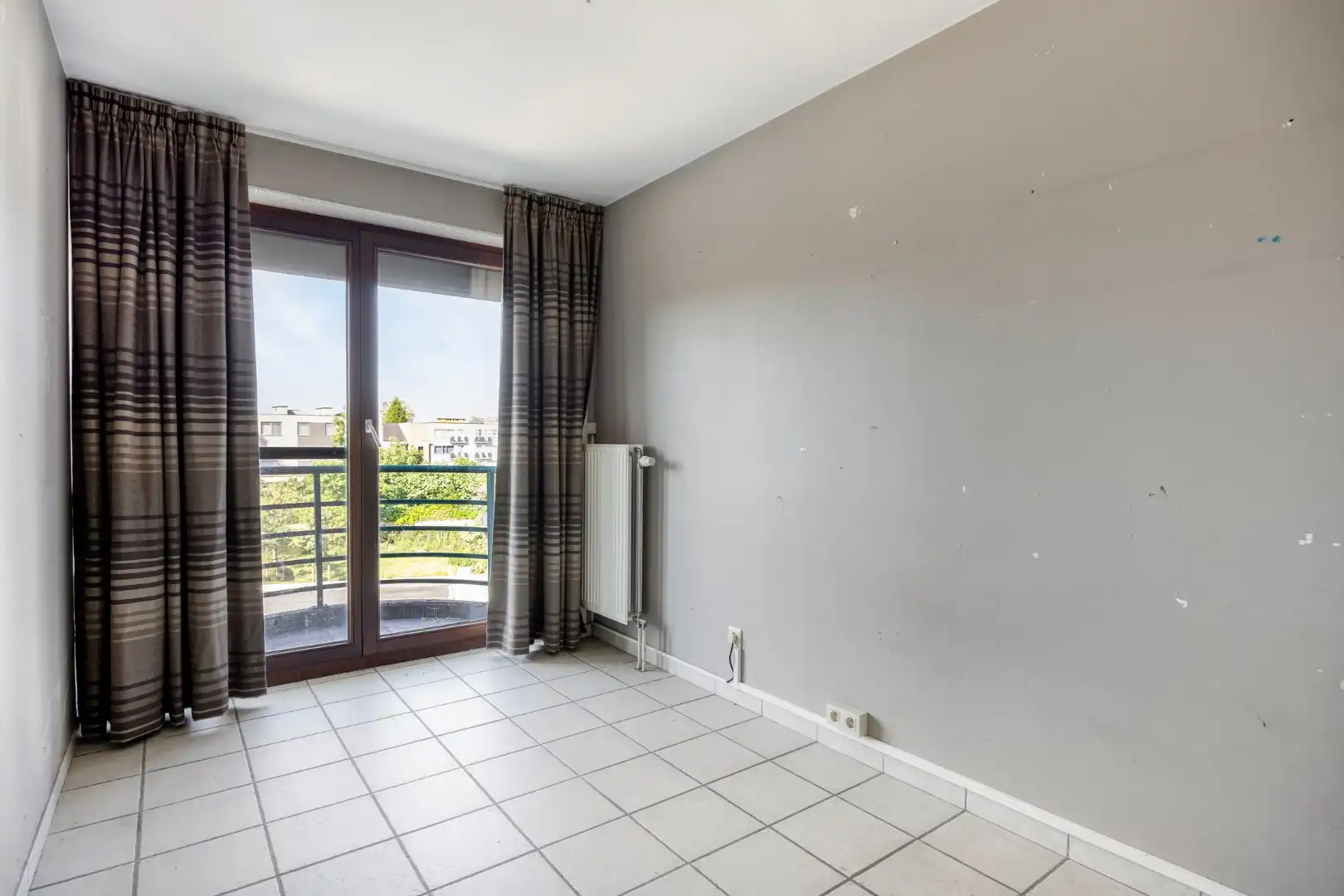 Appartement met 2 SLPKS en garage op gunstige locatie in het centrum. foto 12