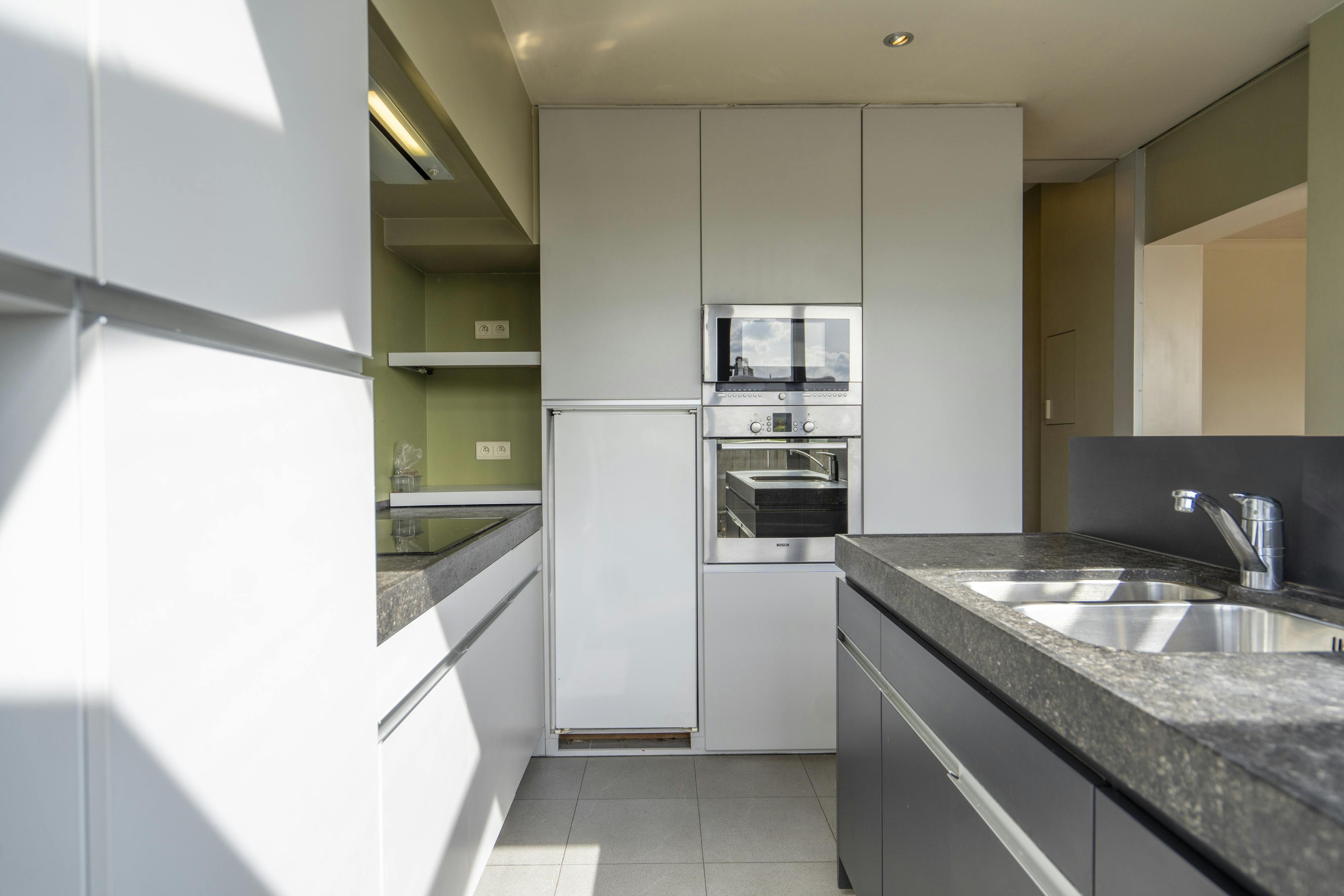 Penthouse (147m²) te koop in hartje Kortrijk! foto 9