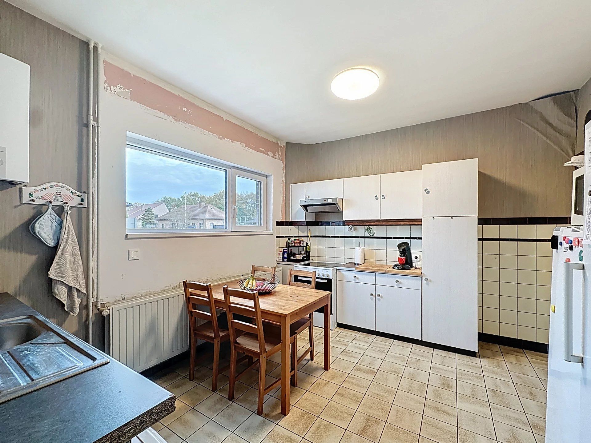 Op te frissen woning met 3 slaapkamers, op een groot perceel, eventueel 2 bouwplaatsen foto 12