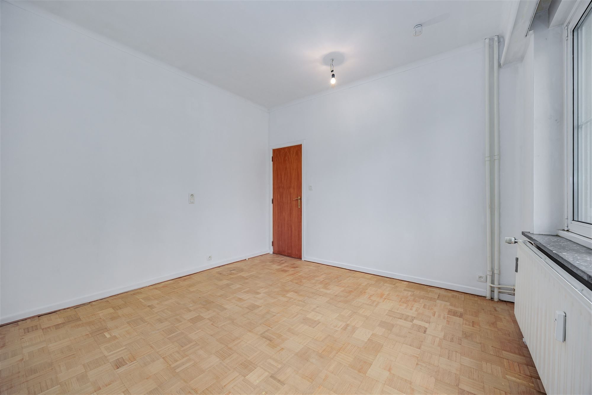 Stijvol appartement met 2 slpk en P foto 9