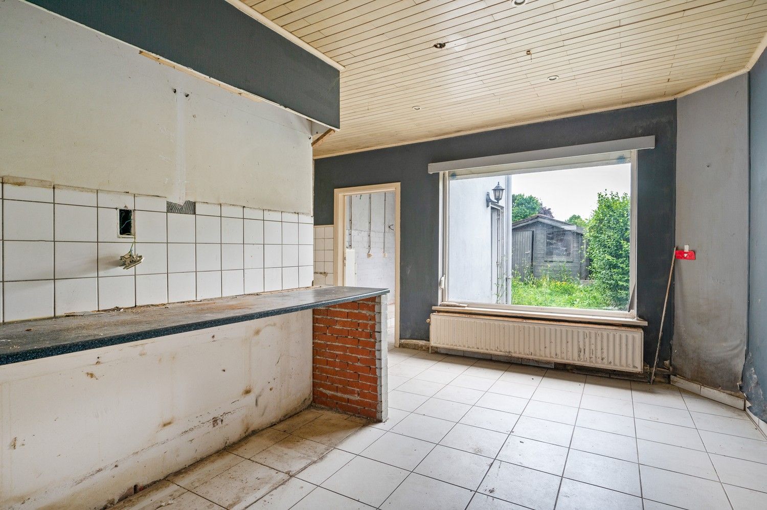 Charmante te renoveren rijwoning met veel potentieel op gunstige locatie in Lier foto 7