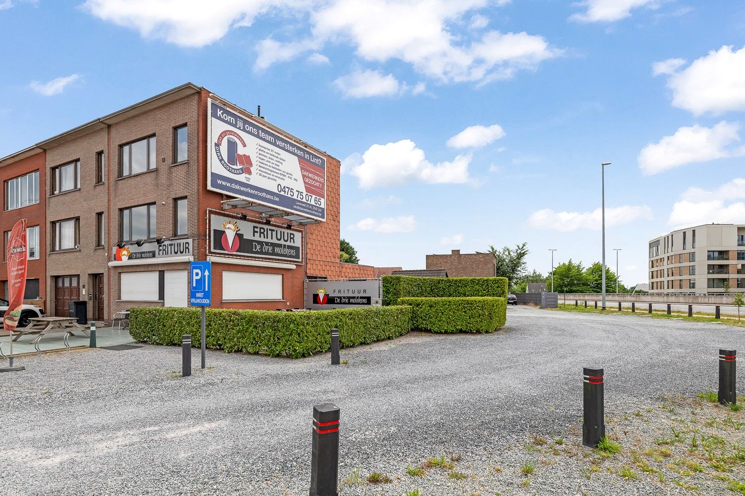 Handelspand met aanpalende bouwgrond + parking foto 21