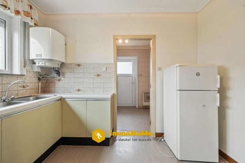 Te renoveren woonst in een rustige wijk te koop in Moerbeke foto 7