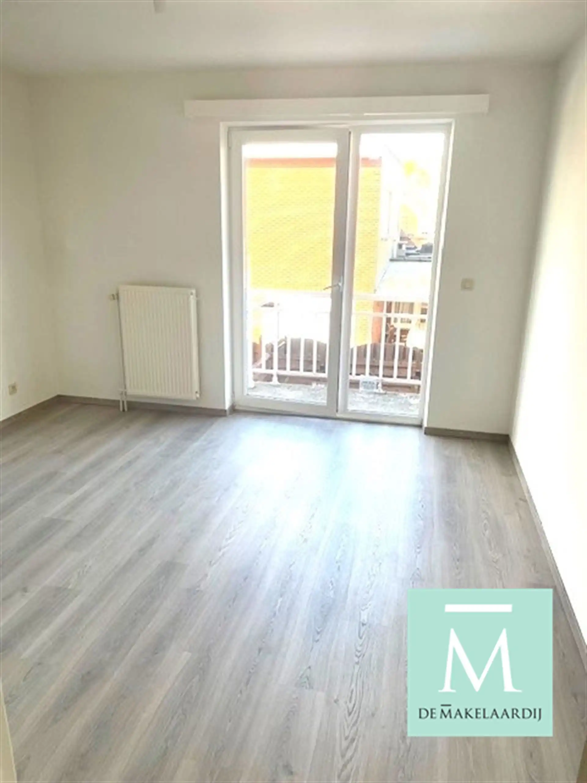 Goed gelegen, gerenoveerd appartement met 2 slaapkamers, terras en garage! foto 6