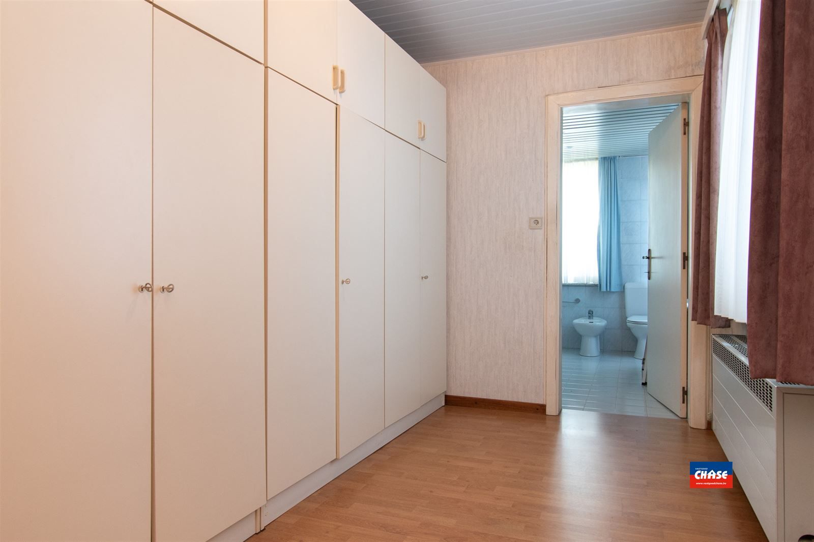 Rijwoning met 2 slpks, zolder en tuin foto 13