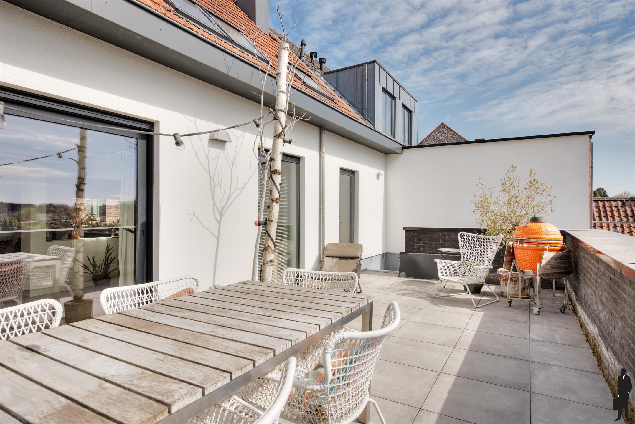 Ruime duplex met 3 slpk, carport, terras en tuin foto 12