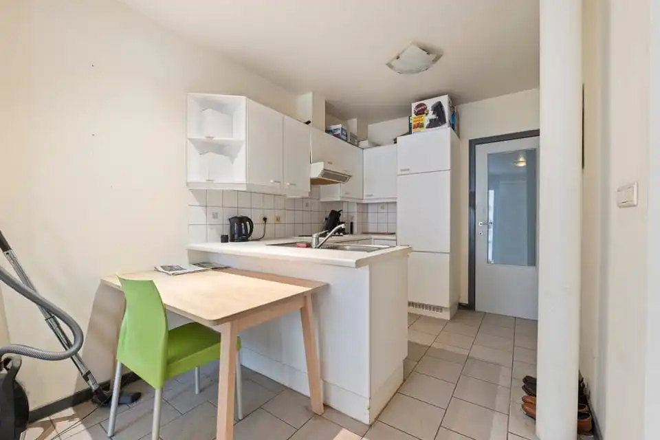 KNAP HANDELSPAND MET TWEE APART VERHUURDE APPARTEMENTEN IN HET CENTRUM VAN SINT-TRUIDEN foto 22