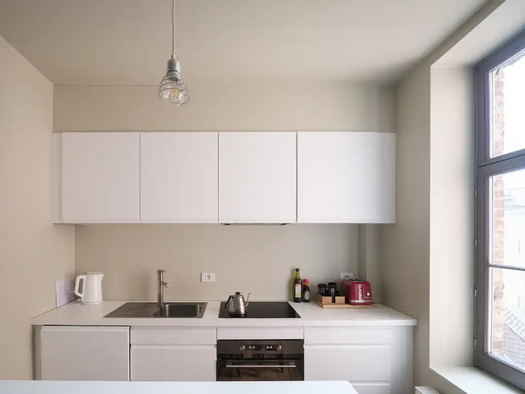 Karaktervol handelspand (restaurant + 2-slpk app) in het centrum van Gent foto 18