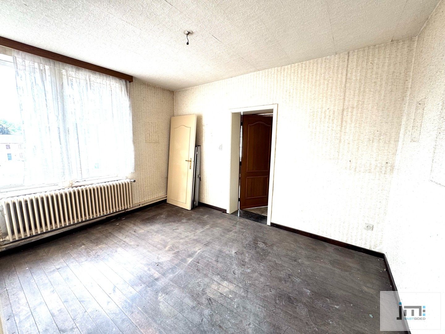 Twee woningen met potentieel in het landelijke Voort foto 6