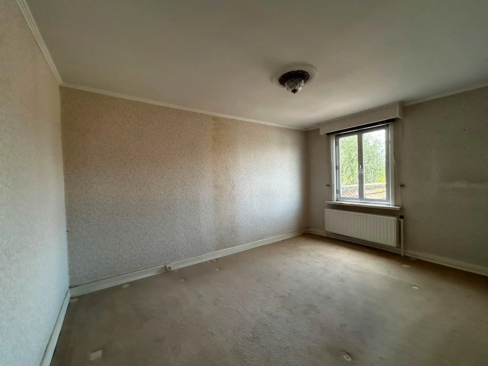Ruime woning in centrum Deinze met 3 slaapkamers en tuin foto 12
