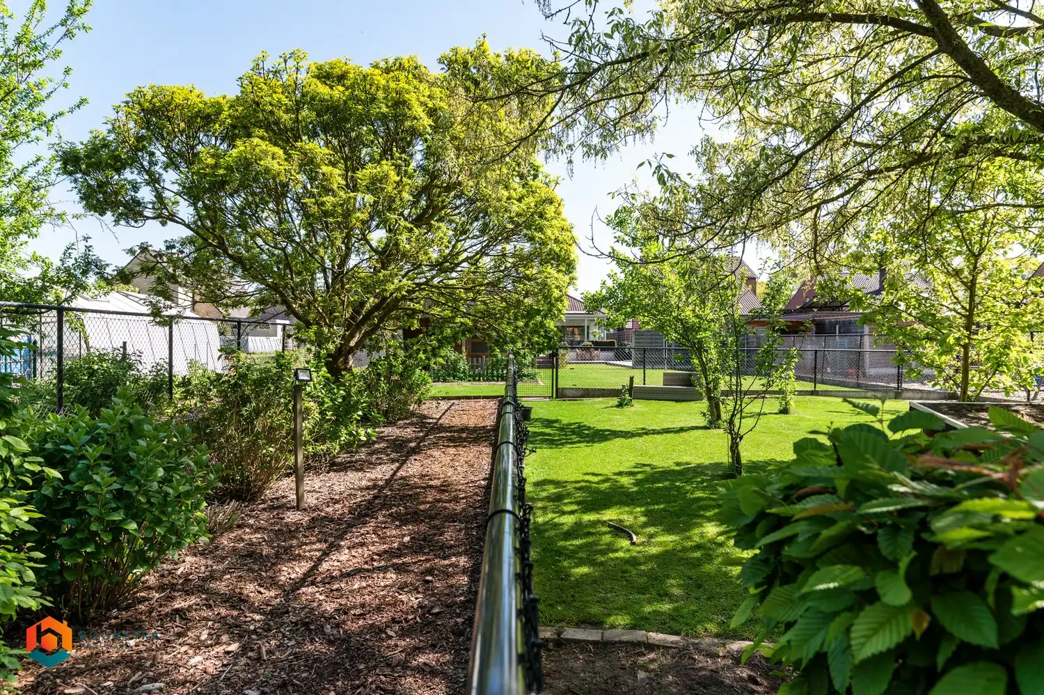 Gelijkvloerse woning met 3 slpkrs en prachtige tuin foto 22