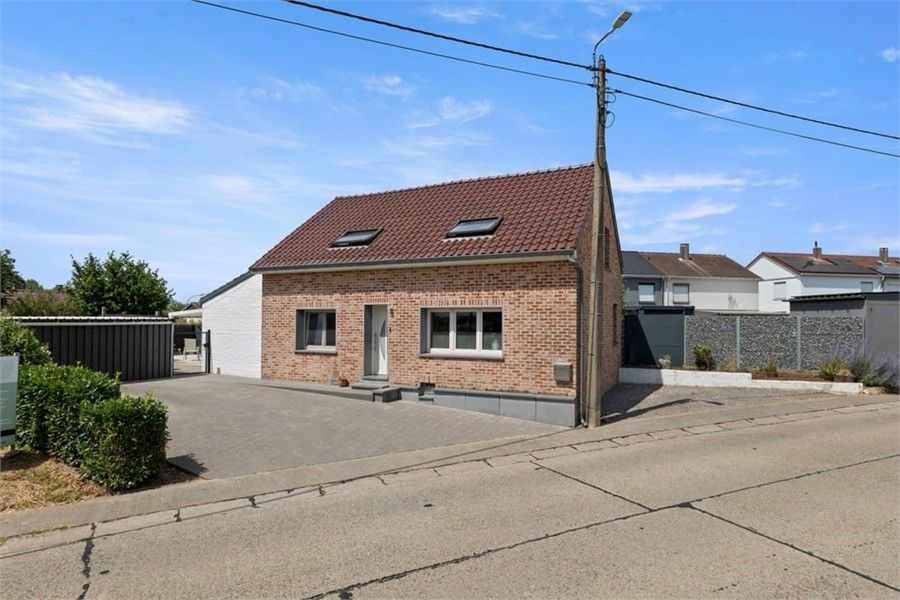 Hoofdfoto van de publicatie: KNUSSE GEZINSWONING IN HET RUSTIG GELEGEN WAASMONT