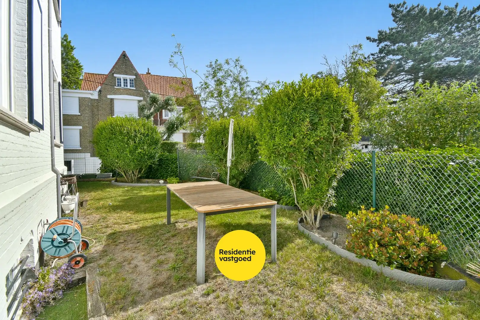 Instapklaar gelijkvloers appartement met privatieve toegang, garage, zonnige tuin en terras nabij zee foto 20