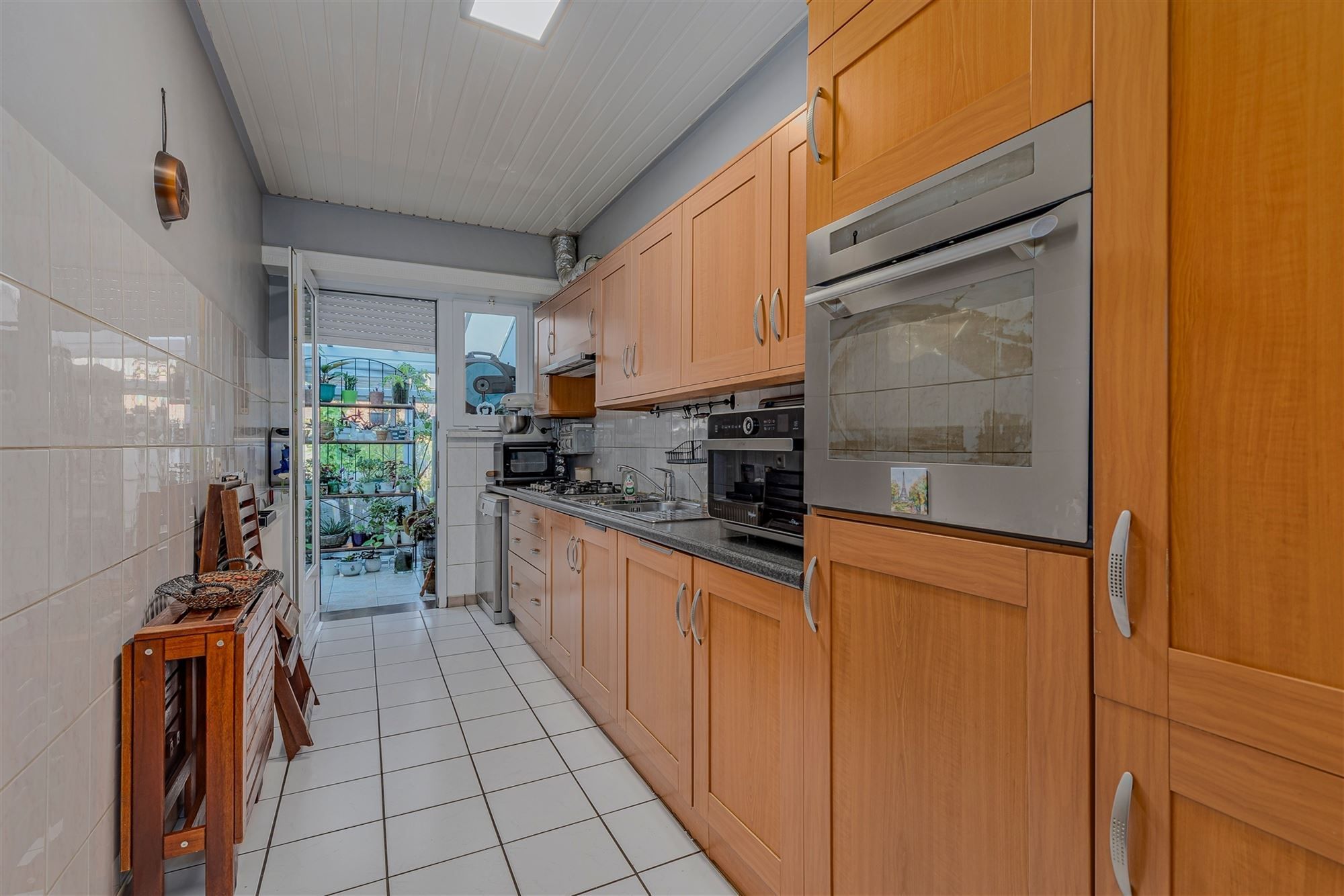 Mooi ingerichte woning met 4 slk, 2 badk en ruime stadstuin in Merksem foto 10