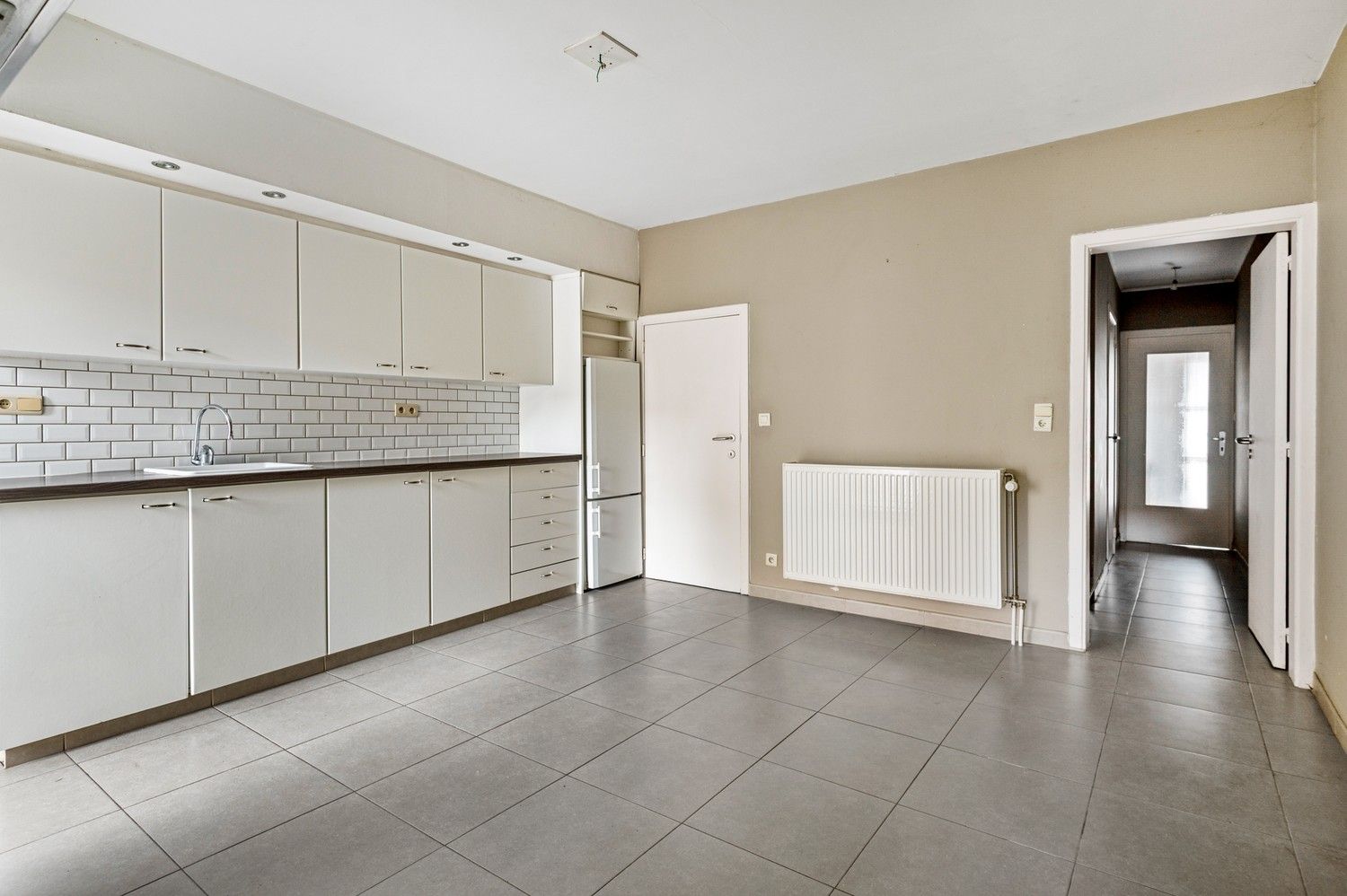 Huis met 1 slaapkamer, garage en terras in het centrum van Wijnegem! foto 3