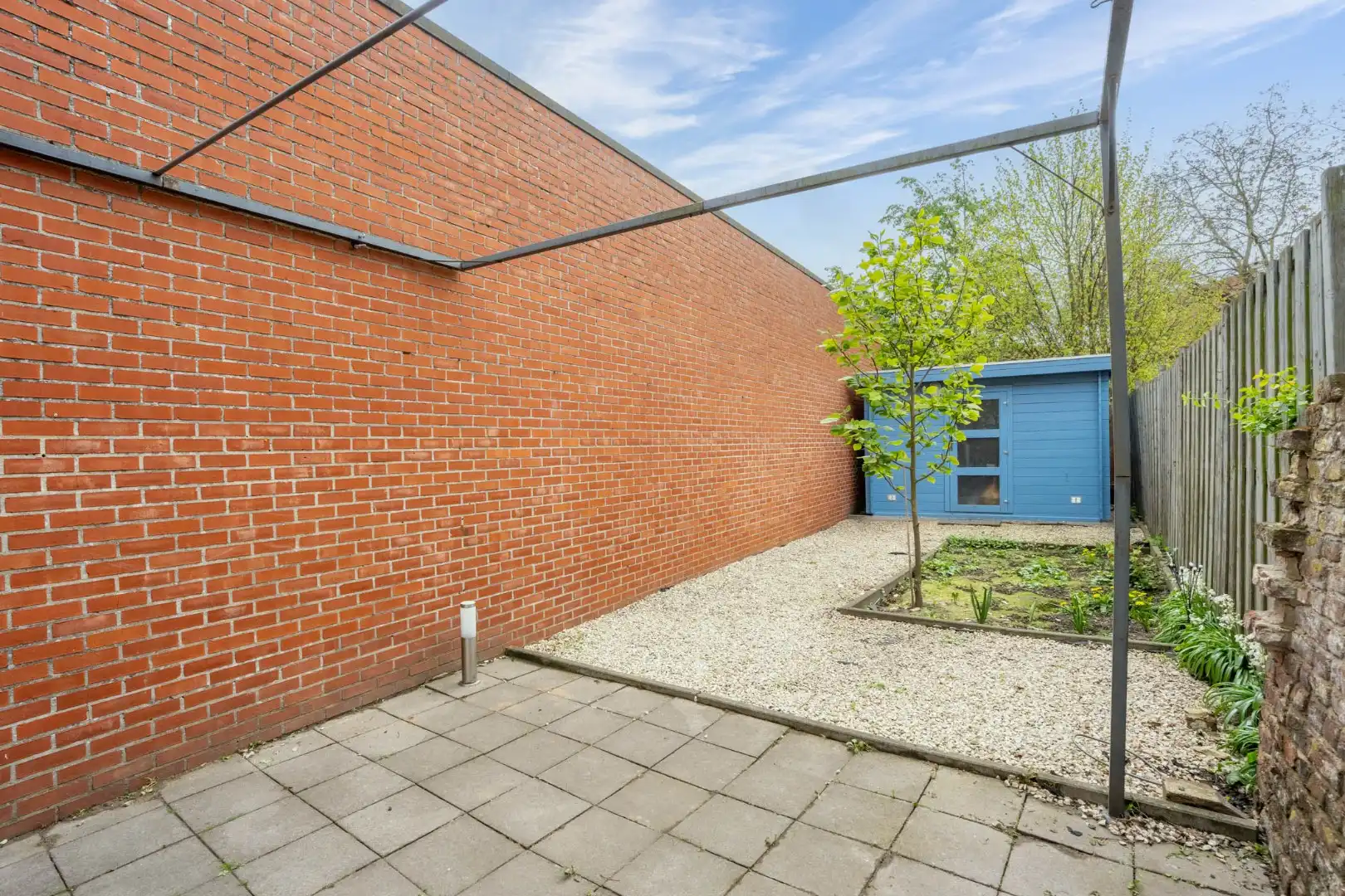 Een knusse rijwoning met tuintje en 3 slaapkamers, gelegen pal in het centrum van Maaseik. foto 21