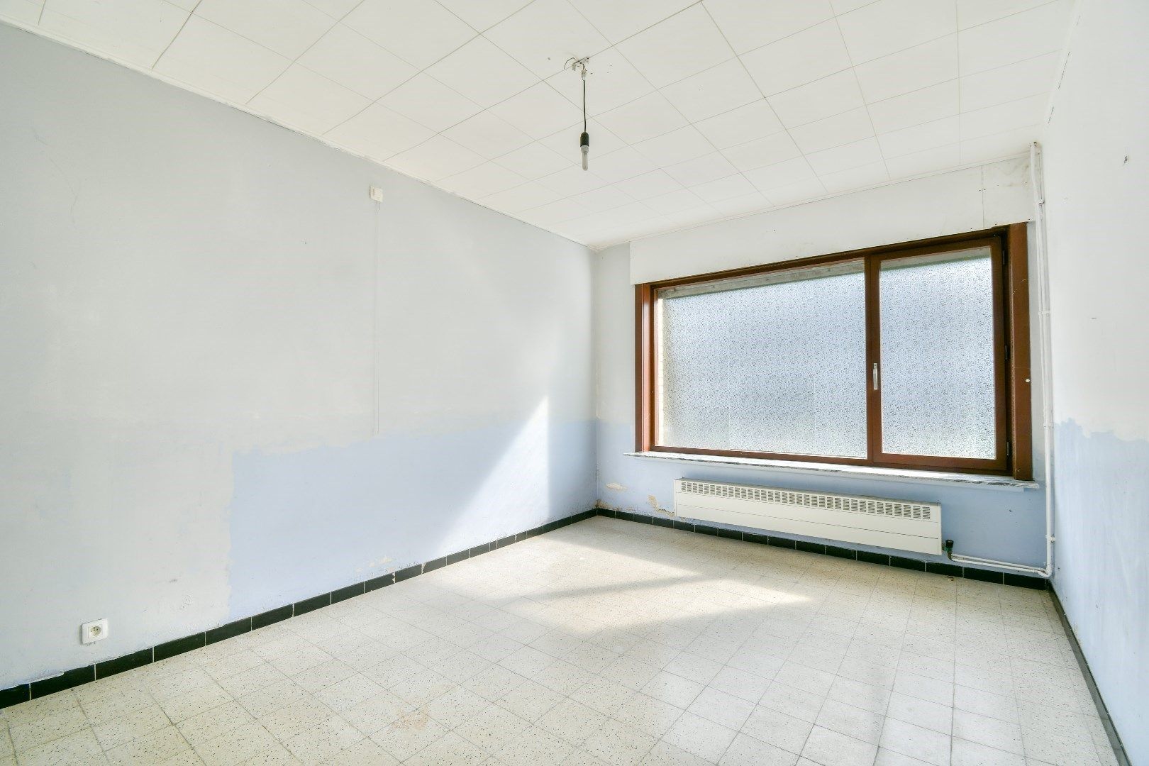 Halfopen bebouwing met renovatiepotentieel! foto 7
