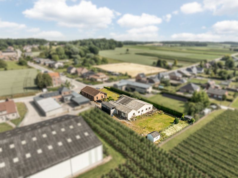 Gelijkvloerse woning met grote loods achteraan op 25are foto 42