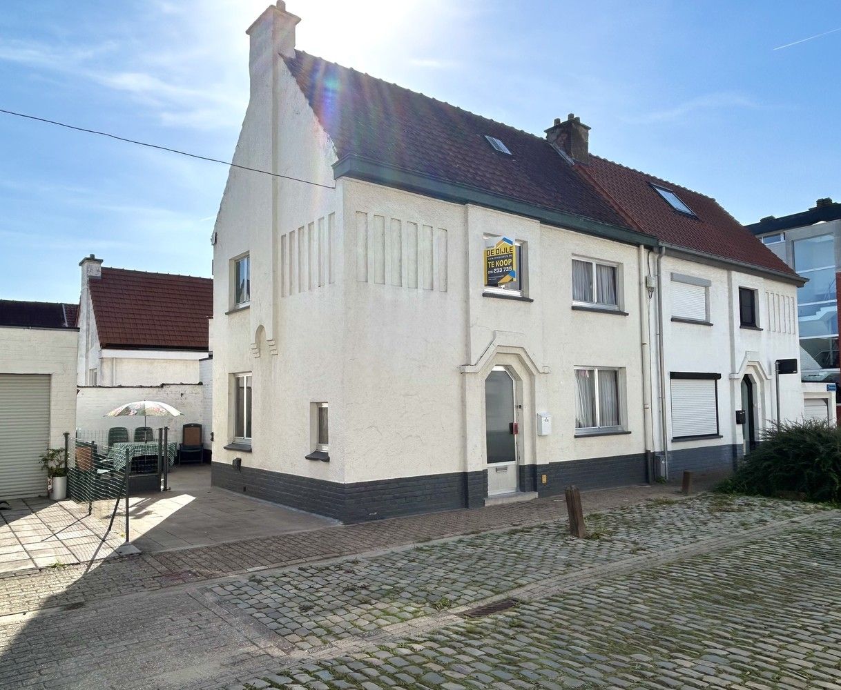 Te renoveren woning in centrum Leuven met privatieve parking naast de deur! foto 1