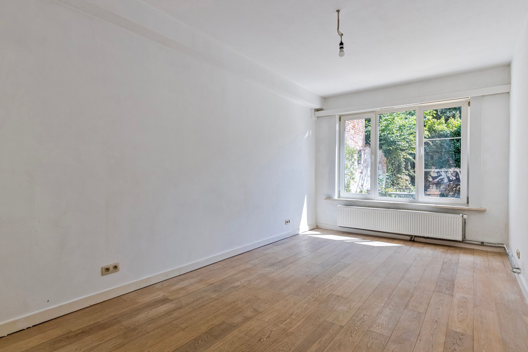 Instapklaar 1-slaapkamerappartement met ruime tuin. foto 6