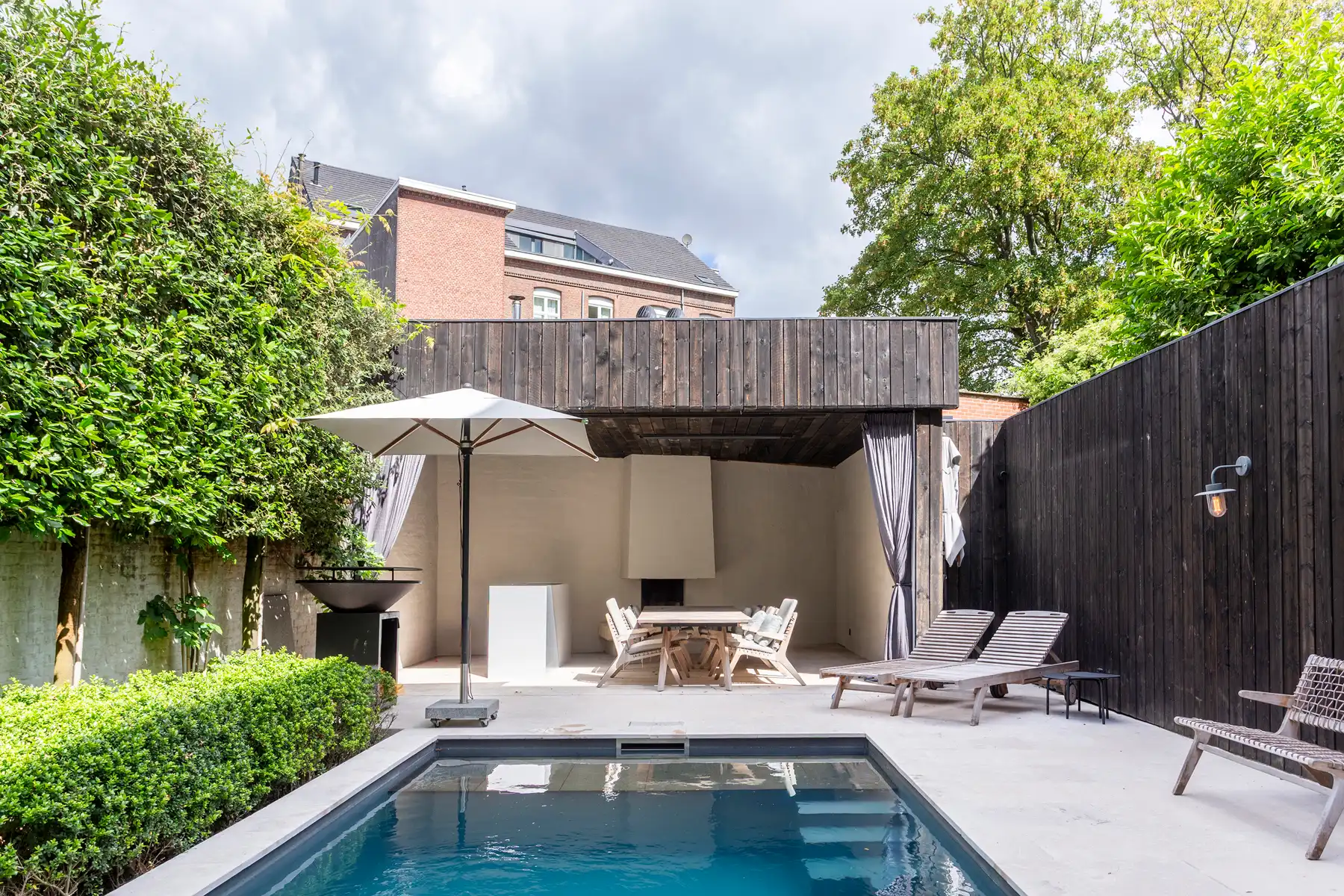 Luxueus gelijkvloers appartement met tuin en zwembad foto 4