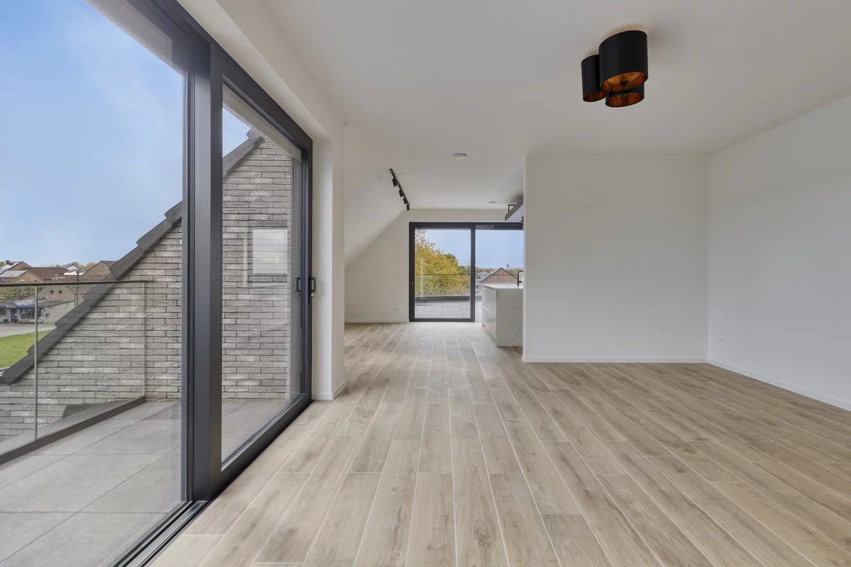 EXCLUSIEF EN KWALITATIEF NIEUWBOUWAPPARTEMENT VAN 163 M² MET 3 SLPK'S, 2 BADK'S EN RIANTE TERRASSEN IN MUNSTERBILZEN foto 5