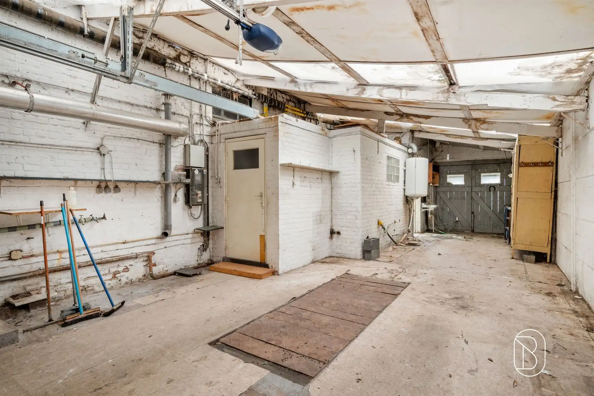 Woning met tuin en grote garage  foto 18