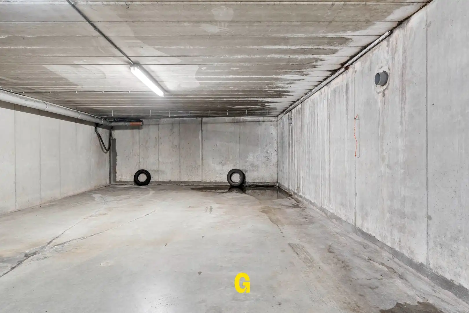 Uitstekend verzorgd 2-slaapkamer appartement in hartje Bilzen, met standplaats, kelderberging en terras met zicht op het Park van Haffmans foto 31