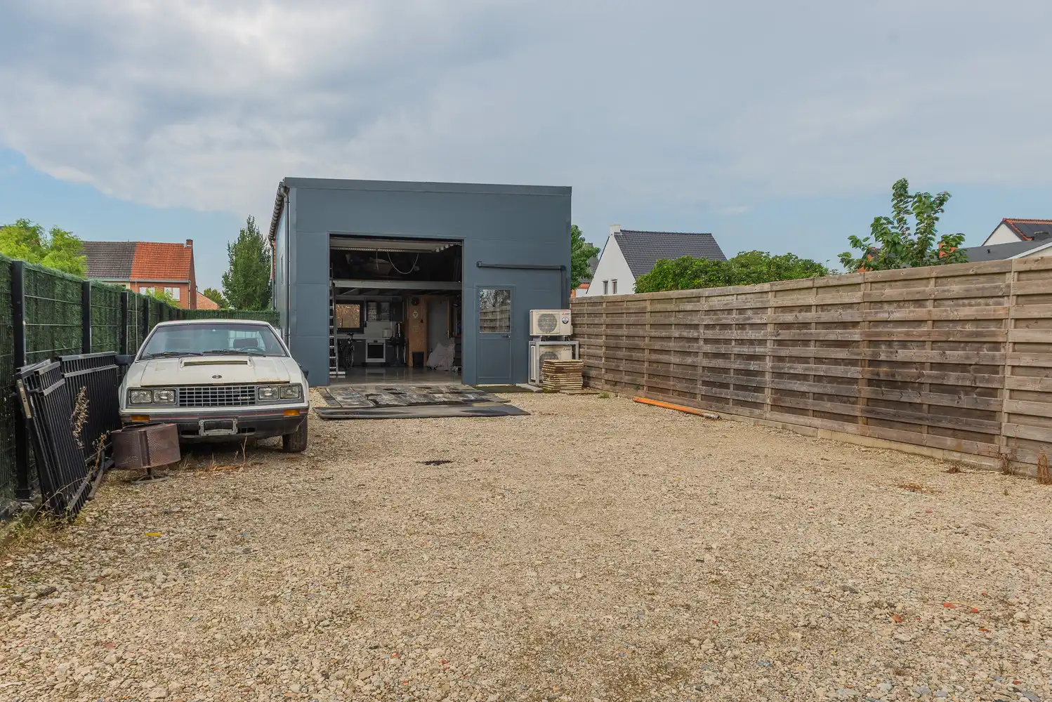 Halfopen woning op een perceel van 532 m² met ruime garage/werkplaats foto 32