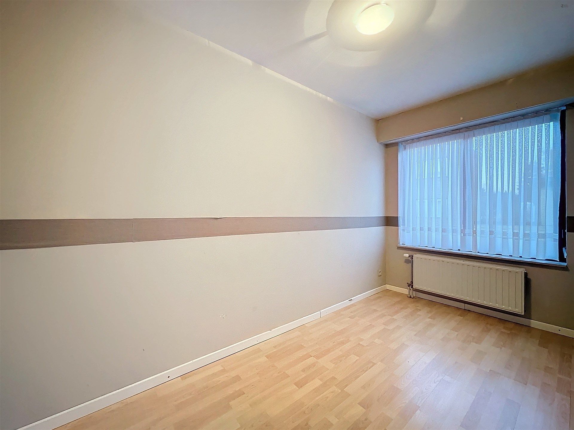 Ruim 3-slk appartement met overdekt terras op centrale ligging foto 9