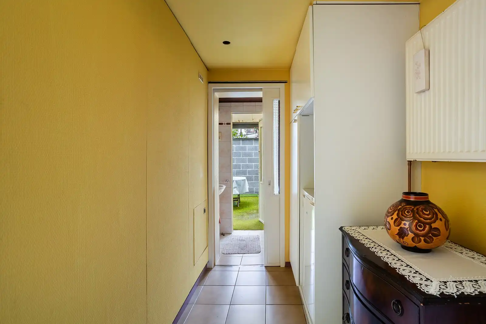 Woning met veel potentieel en zuidwestgerichte stadskoer  foto 10