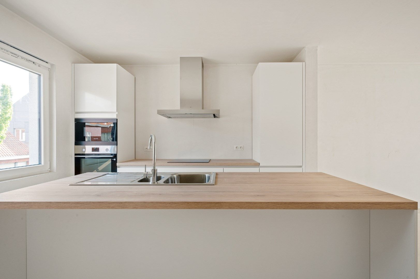 NIEUWBOUWAPPARTEMENTSGEBOUW BESTAANDE UIT 3 APPARTEMENTEN MET CARPORTS foto 6