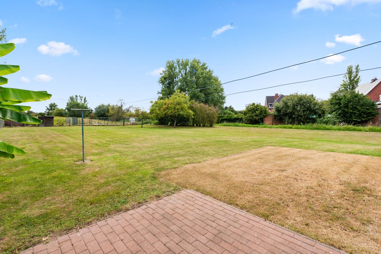Open bebouwing op topligging met 3 slaapkamers en prachtige tuin foto 27