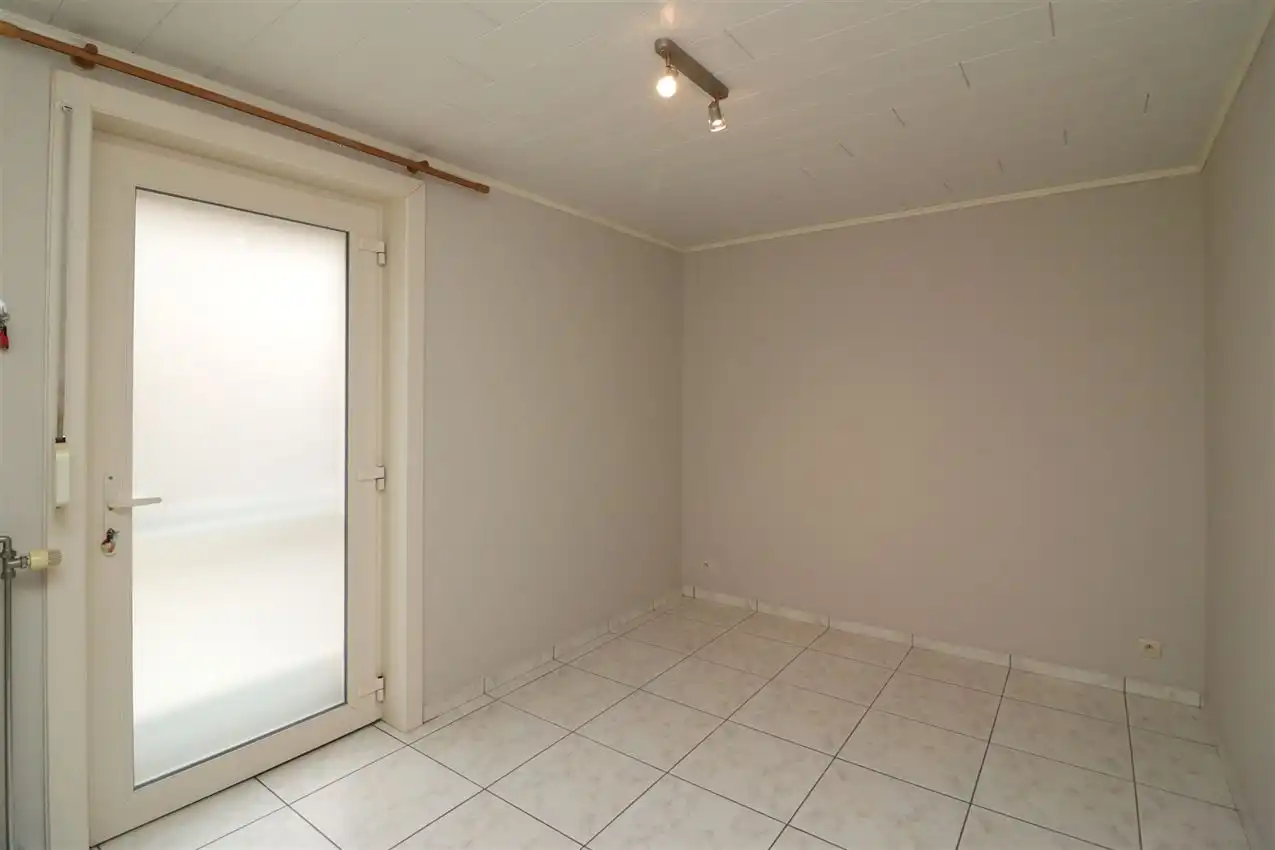 Gelijkvloers wonen met tuintje en autostaanplaats in centrum foto 22