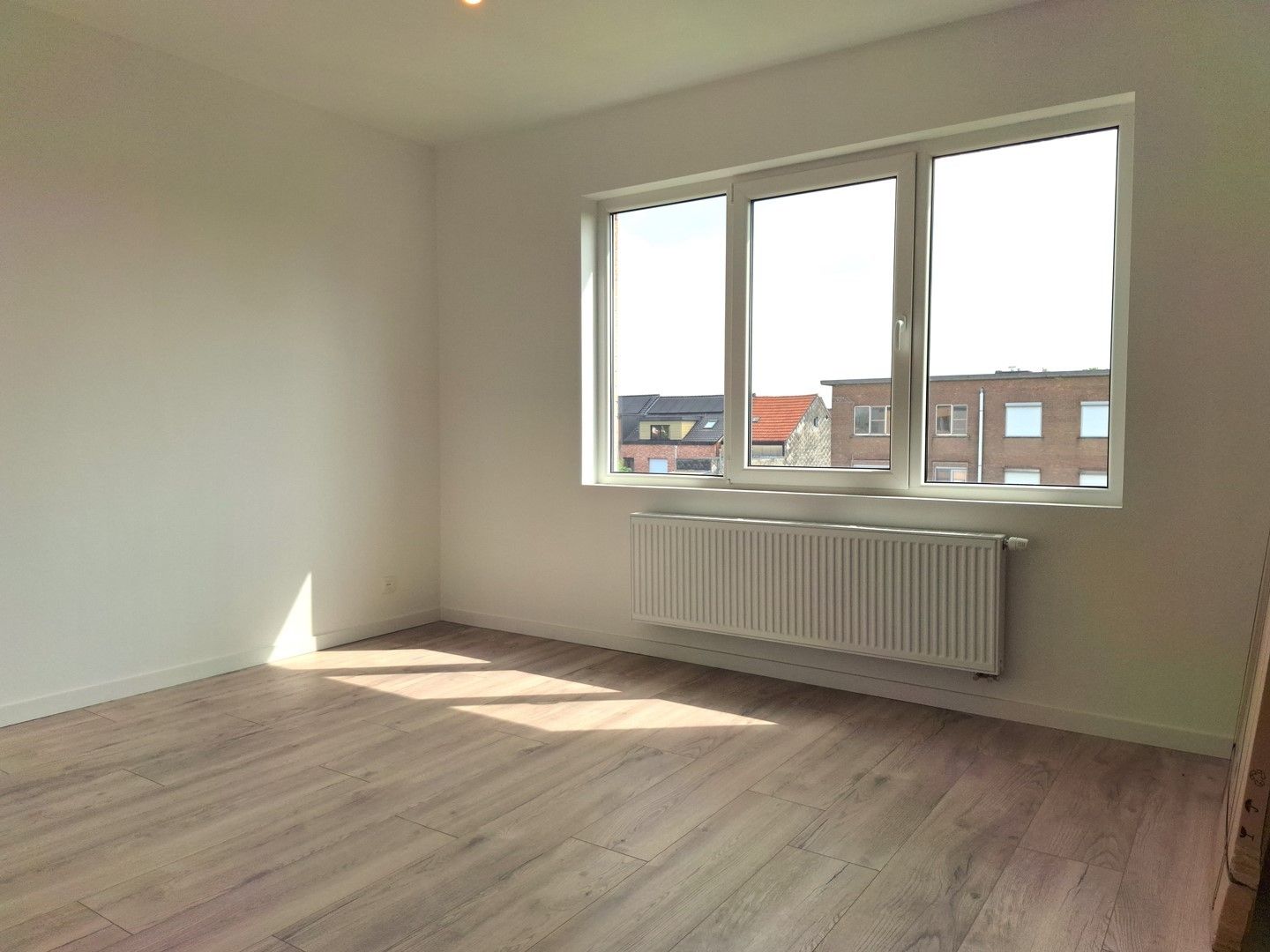 Lichtrijk appartement met 2 slaapkamers, 2 balkons, autostaanplaats en kelderberging foto 8