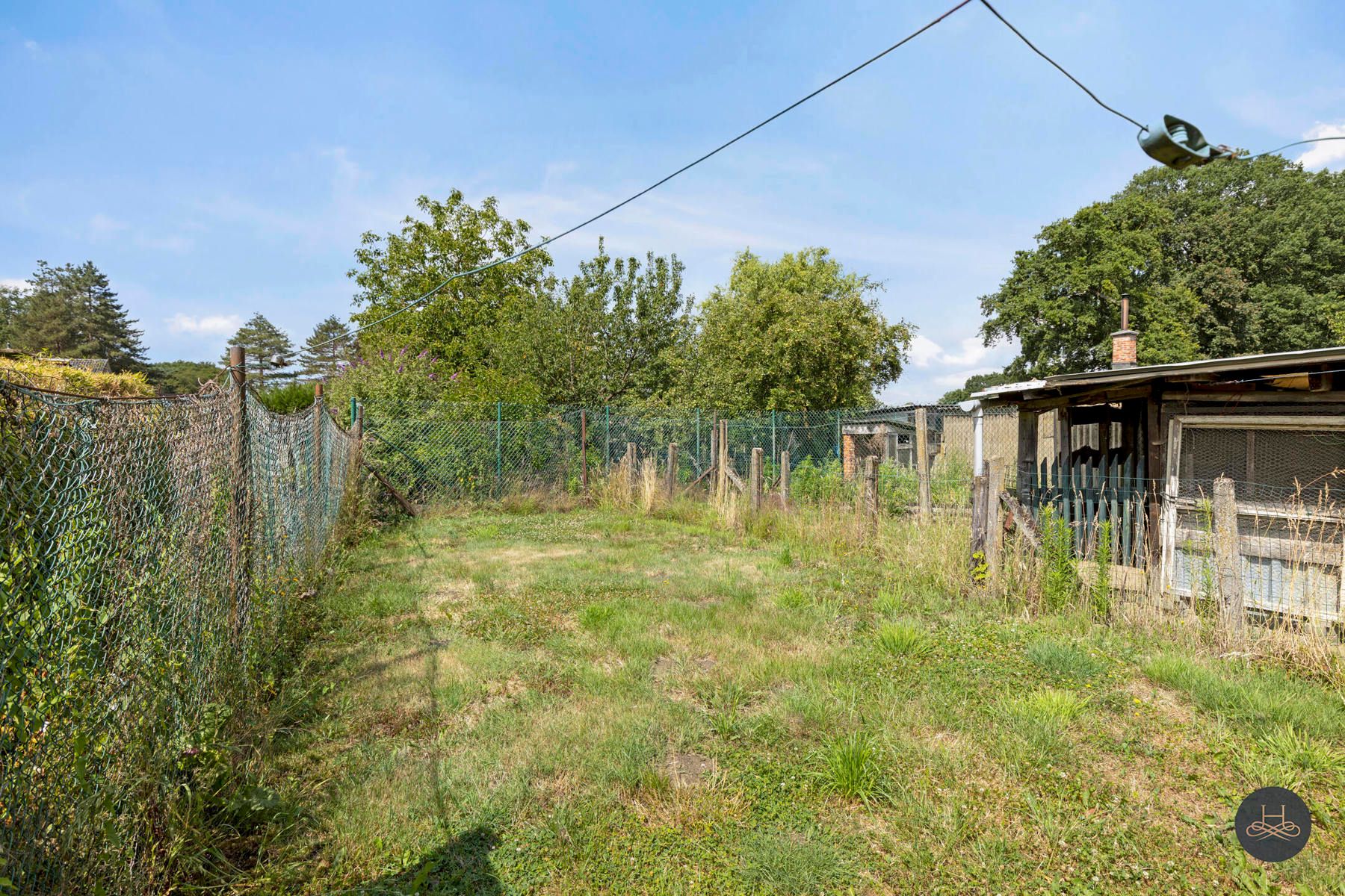 Te renoveren ruime woning met grote tuin en terras foto 24